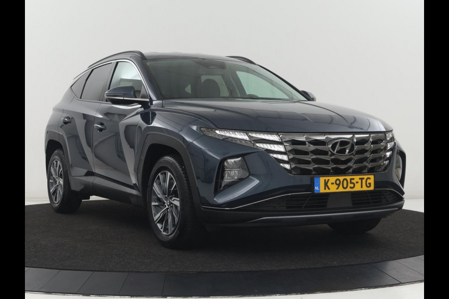 Hyundai Tucson 1.6 T-GDI HEV Comfort | Trekhaak | Stoelverwarming | Adaptive cruise | Carplay | Camera | Navigatie | Keyless | Full LED | 17'' | Parkeerhulp | Climate control | Digital Cockpit