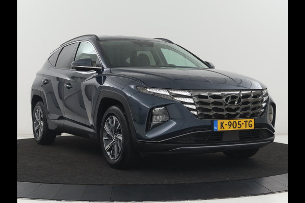 Hyundai Tucson 1.6 T-GDI HEV Comfort | Trekhaak | Stoelverwarming | Adaptive cruise | Carplay | Camera | Navigatie | Keyless | Full LED | 17'' | Parkeerhulp | Climate control | Digital Cockpit
