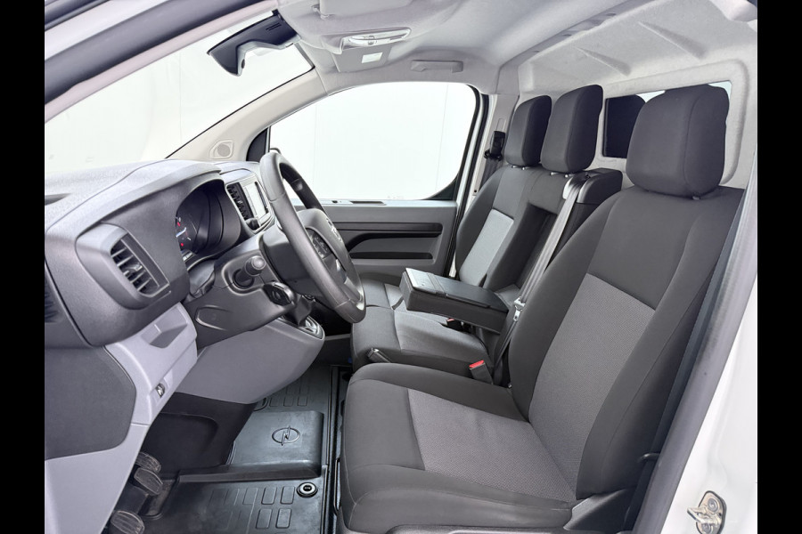 Opel Vivaro 2.0CDTI 145pk L2H1 3-Pers. Trekhaak Euro 6 Navi Apple Carplay Android Auto Airco Cruise Control Pdc Edition Regen-Lichtsensor Betonplex Vloer Wandbetimmering Schuifdeur 2.500KG Trekgewicht Origineel Nederlandse Bus