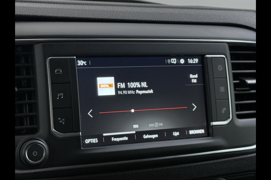 Opel Vivaro 2.0CDTI 145pk L2H1 3-Pers. Trekhaak Euro 6 Navi Apple Carplay Android Auto Airco Cruise Control Pdc Edition Regen-Lichtsensor Betonplex Vloer Wandbetimmering Schuifdeur 2.500KG Trekgewicht Origineel Nederlandse Bus