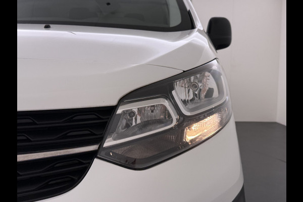 Opel Vivaro 2.0CDTI 145pk L2H1 3-Pers. Trekhaak Euro 6 Navi Apple Carplay Android Auto Airco Cruise Control Pdc Edition Regen-Lichtsensor Betonplex Vloer Wandbetimmering Schuifdeur 2.500KG Trekgewicht Origineel Nederlandse Bus