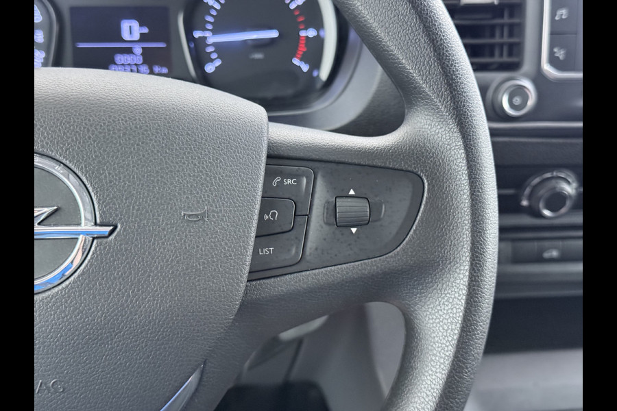 Opel Vivaro 2.0CDTI 145pk L2H1 3-Pers. Trekhaak Euro 6 Navi Apple Carplay Android Auto Airco Cruise Control Pdc Edition Regen-Lichtsensor Betonplex Vloer Wandbetimmering Schuifdeur 2.500KG Trekgewicht Origineel Nederlandse Bus