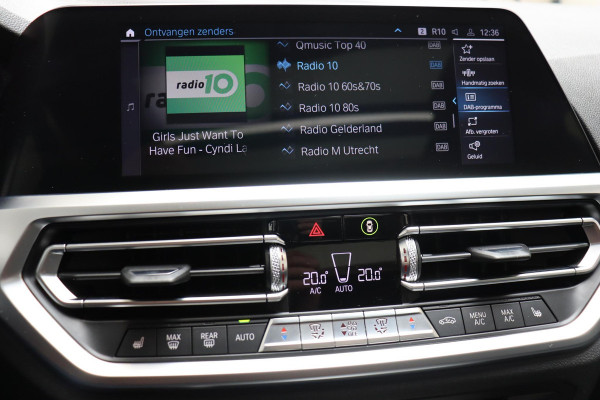 BMW 3 Serie Touring 330e Business Edition Plus M Sport Pakket Automaat / Navigatiesysteem Professional / Head-Up Display / Panoramadak / Adaptief M Onderstel / Stoelverwarming / HiFi / Adaptieve Cruise Control / Leder / 19 Inch /