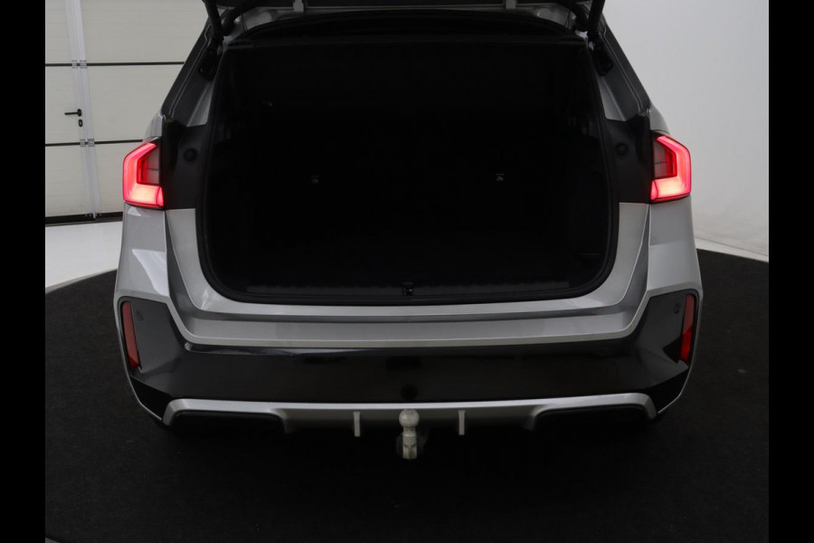 BMW X1 xDrive25e M Sport | SOH 93% | Head-Up | 360 Camera | Stoelverwarming | Trekhaak | Adaptive cruise | Leder/Alcantara | Keyless | Carplay | Side Assist | Adaptief LED | Sportstoelen | PHEV | Plug In