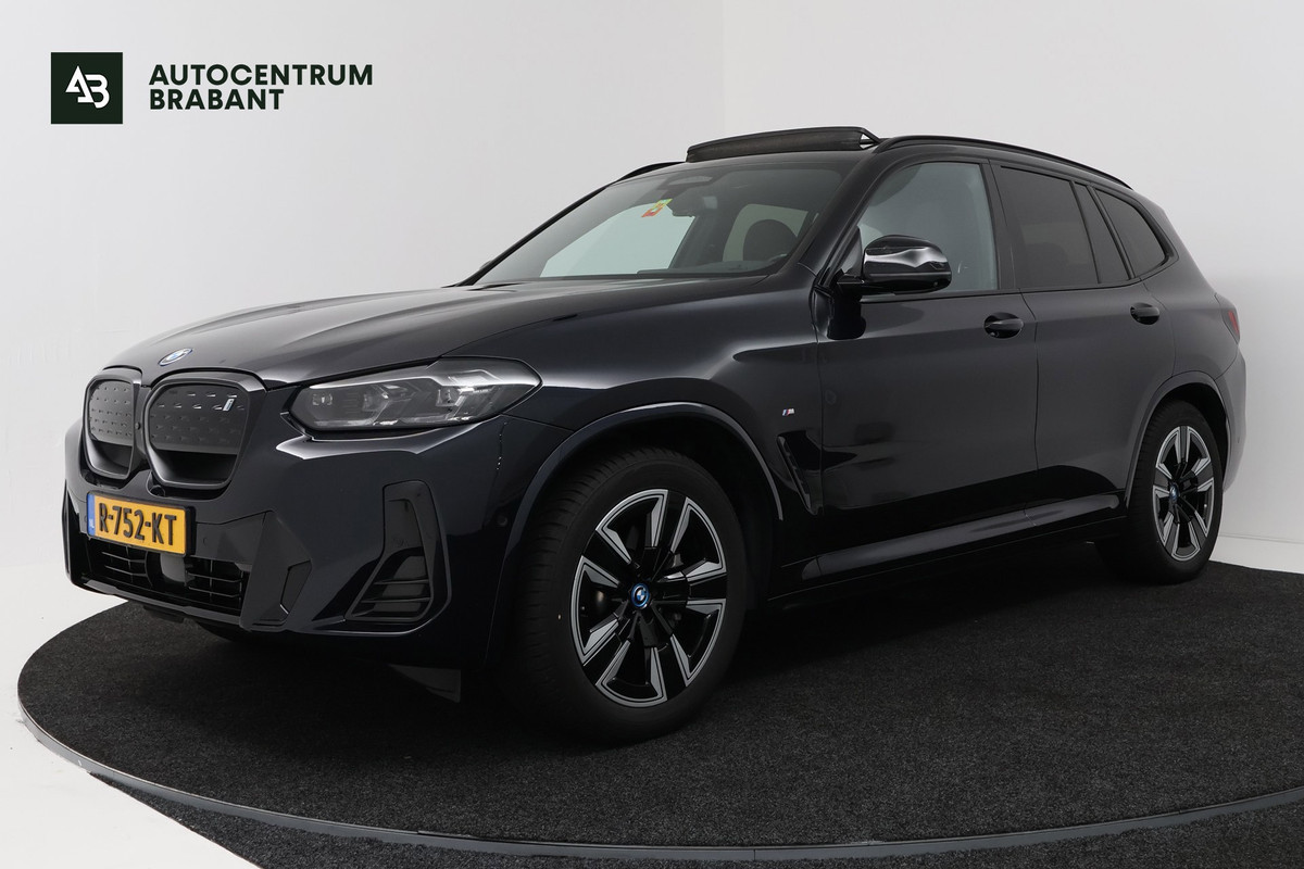 BMW iX3 High Executive 80 kWh M-pakket 97%SoH (1e eigenaar, NL-auto, Dealer OnderH, Panoramadak, Trekhaak, Navi Pro, StoelV, Etc)