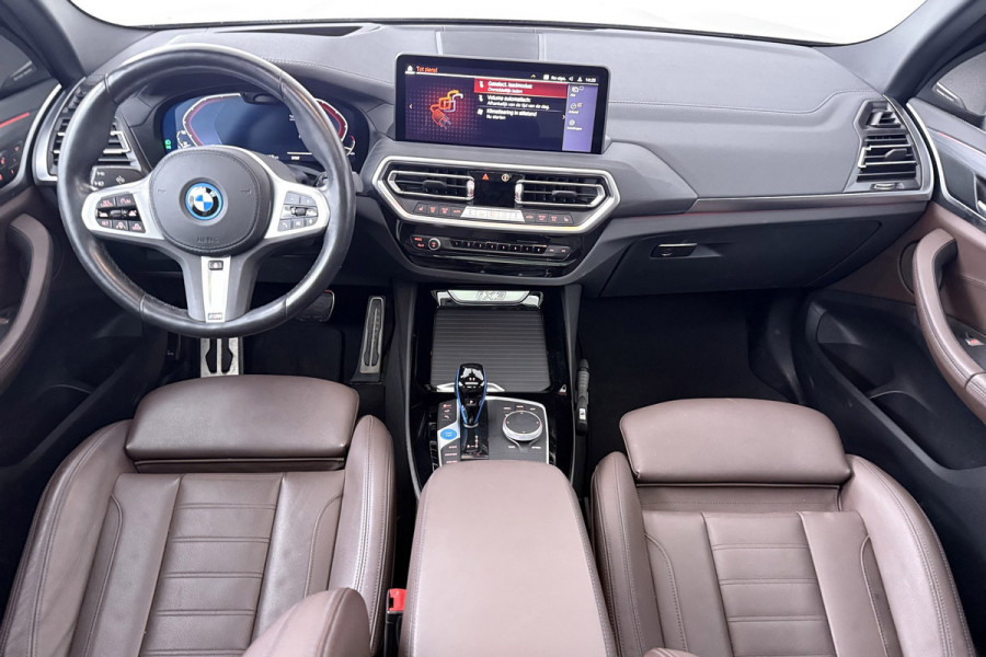 BMW iX3 High Executive 80 kWh M-pakket 97%SoH (1e eigenaar, NL-auto, Dealer OnderH, Panoramadak, Trekhaak, Navi Pro, StoelV, Etc)