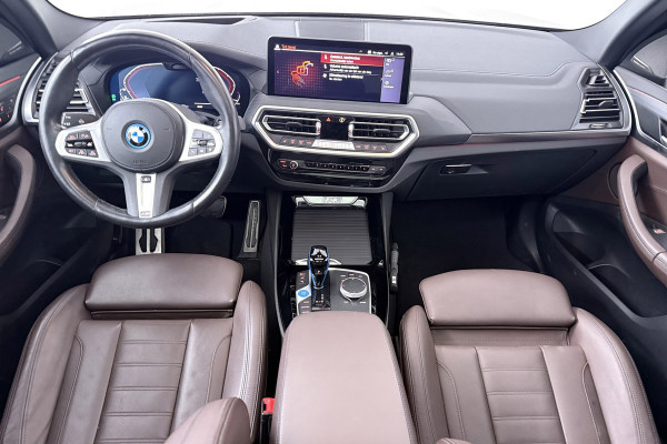BMW iX3 High Executive 80 kWh M-pakket 97%SoH (1e eigenaar, NL-auto, Dealer OnderH, Panoramadak, Trekhaak, Navi Pro, StoelV, Etc)
