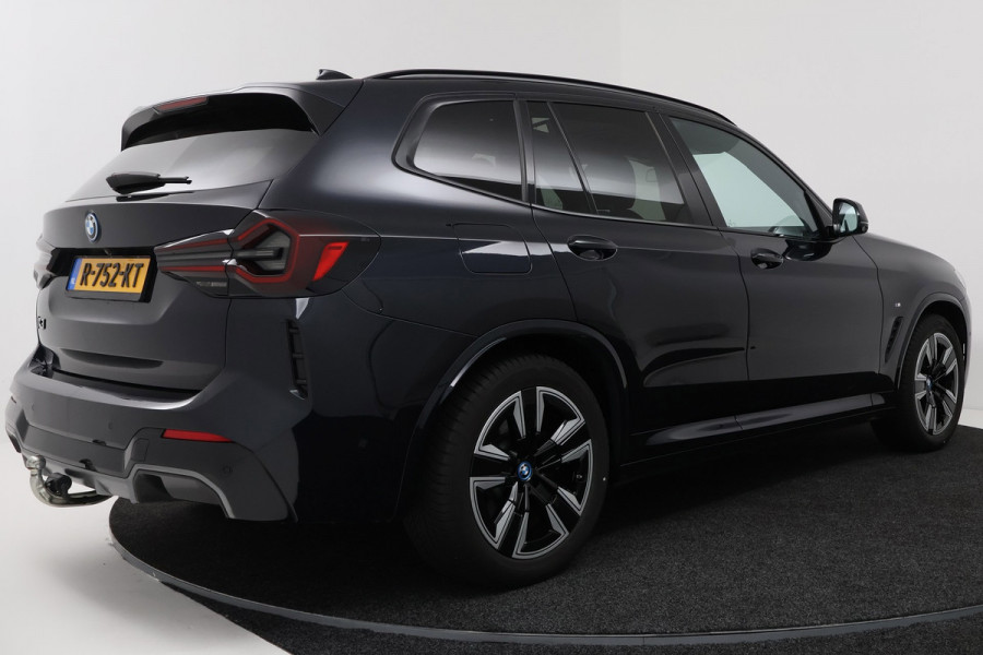 BMW iX3 High Executive 80 kWh M-pakket 97%SoH (1e eigenaar, NL-auto, Dealer OnderH, Panoramadak, Trekhaak, Navi Pro, StoelV, Etc)