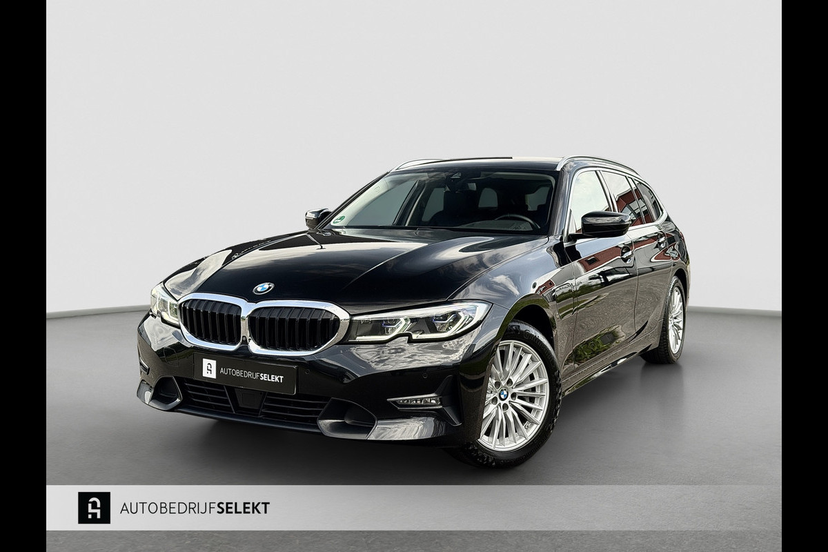 BMW 3 Serie Touring 330e xDrive | Laser | Trekhaak | Head Up | 360 | Sfeerverlichting | Dodehoek | 1e eigenaar