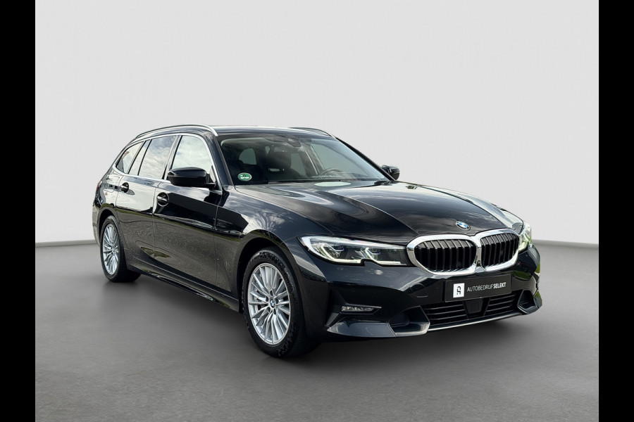 BMW 3 Serie Touring 330e xDrive | Laser | Trekhaak | Head Up | 360 | Sfeerverlichting | Dodehoek | 1e eigenaar