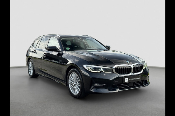 BMW 3 Serie Touring 330e xDrive | Laser | Trekhaak | Head Up | 360 | Sfeerverlichting | Dodehoek | 1e eigenaar