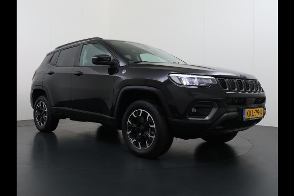Jeep Compass 4xe 240 Plug-in Hybrid Electric Trailhawk VAN: 31.900,- VOOR: 28.877,- UW WKVOORDEEL: 3.023,- | 1.3 Plug-In Hybrid | 4WD PHEV | ADAPTIVE CRUISE CONTROL | ACHTERUIT RIJ CAMERA | 20.000KM |