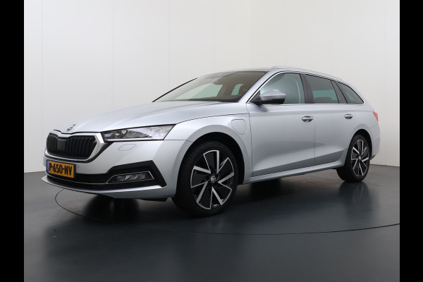 Škoda Octavia Combi 1.4TSI 245PK Automaat iV PHEV Hybride Adap.Cruise Stoelverwarming Navi 3-Zone Ecc Apple Carplay Android Auto Pdc Business  Elek.Achterklep Keyless advanced Lmv 18" Voorruitverwarming Led DAB 1e Eigenaar Origineel Nederlandse Auto
