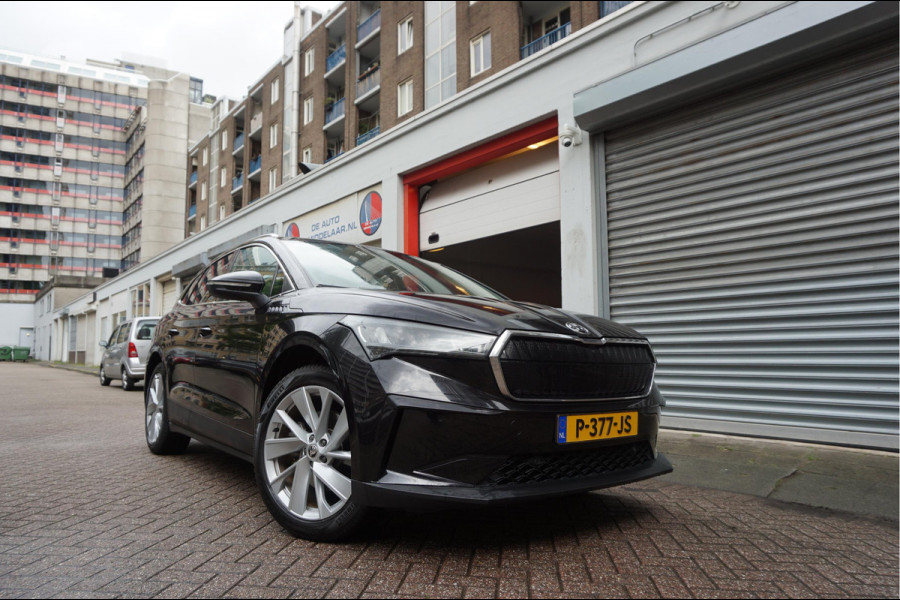 Škoda ENYAQ iV 60 | NL Auto | 1ste eigenaar | Trekhaak | Adaptive+Lane | Sfeer | 20inch | Leer/ stof | Luxe zeer nette auto