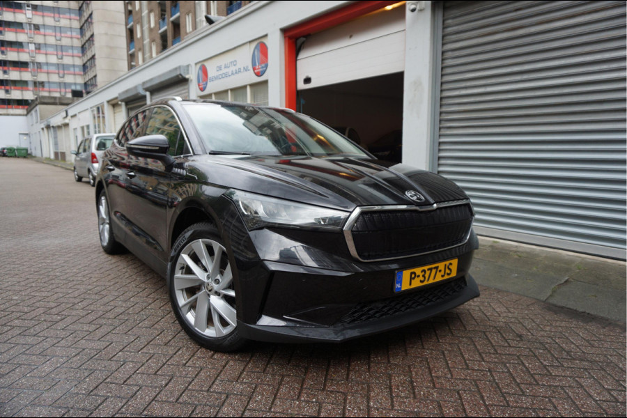 Škoda ENYAQ iV 60 | NL Auto | 1ste eigenaar | Trekhaak | Adaptive+Lane | Sfeer | 20inch | Leer/ stof | Luxe zeer nette auto