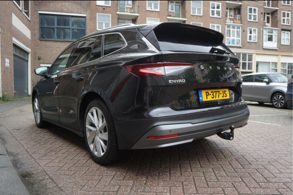 Škoda ENYAQ iV 60 | NL Auto | 1ste eigenaar | Trekhaak | Adaptive+Lane | Sfeer | 20inch | Leer/ stof | Luxe zeer nette auto