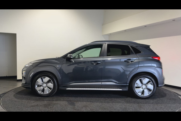 Hyundai Kona EV Premium 64 kWh | Voorstoelen verwarmd & gekoeld | Trekhaak | Warmtepomp | Soh (batterijcheck) Waarde 90,4 %