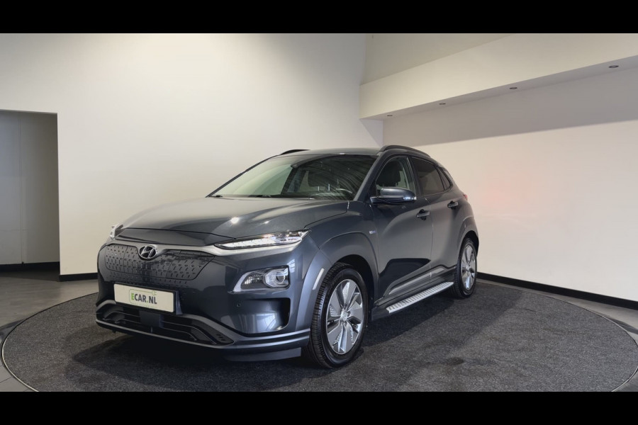 Hyundai Kona EV Premium 64 kWh | Voorstoelen verwarmd & gekoeld | Trekhaak | Warmtepomp | Soh (batterijcheck) Waarde 90,4 %