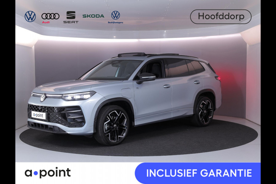 Volkswagen Tayron 1.5 eHybrid R-Line Edition 204 pk Automaat (DSG) | Verlengde garantie | Navigatie | Panoramadak | Trekhaak (wegklapbaar) | Parkeersensoren (Park assist) | Rondomzicht camera | Stoelverwarming | R-Line |