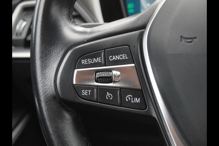 BMW 3-serie 320i Business Edition Plus | Camera | Apple Carplay | Leer | Cruise Control | Dealeronderhouden |