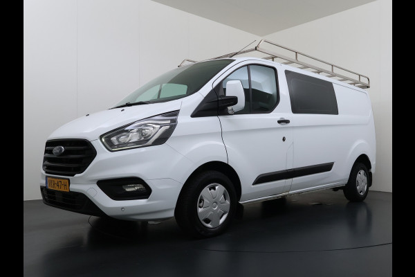 Ford Transit Custom 300 2.0TDCI L2H1 Dubbele Cabine 6-Persoons Trekhaak Navi Camera Cruise Control Imperiaal Airco Stoelverwarming Pdc DC DAB Bluetooth Betonplex Vloer Wandbetimmering 2.750KG Trekgewicht Origineel Nederlandse Auto