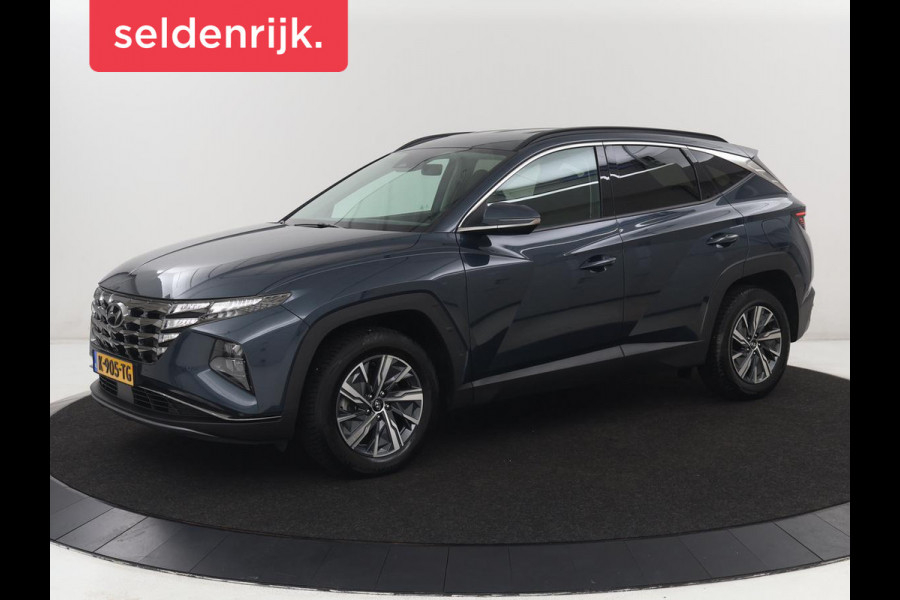 Hyundai Tucson 1.6 T-GDI HEV Comfort | Trekhaak | Adaptive cruise Stoelverwarming | Carplay | Camera | Navigatie | Keyless | Full LED | 17'' | Parkeerhulp | Climate control | Digital Cockpit