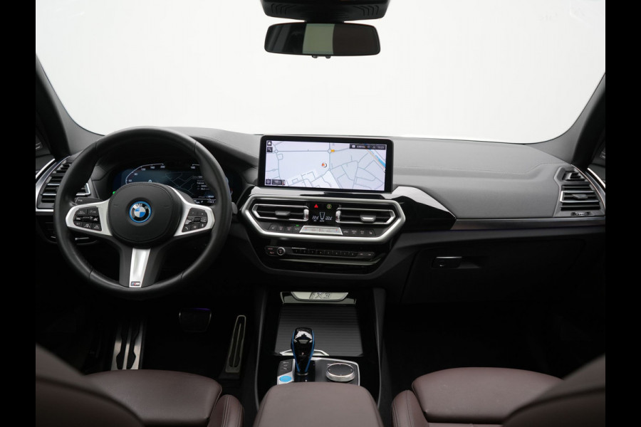 BMW iX3 M Sport 80 kWh 286pk Dealer O.H. | Trekhaak Af Fabriek | Panodak | Head Up | 360 Camera | Harman / Kardon | Lederen Sportstoelen Memory & Verwarmd | Keyless | Blis | Sfeerverlichting | 20"L.M | Adaptive LED |