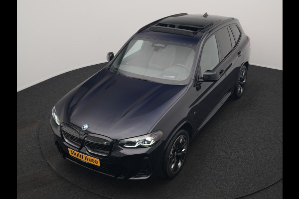 BMW iX3 M Sport 80 kWh 286pk Dealer O.H. | Trekhaak Af Fabriek | Panodak | Head Up | 360 Camera | Harman / Kardon | Lederen Sportstoelen Memory & Verwarmd | Keyless | Blis | Sfeerverlichting | 20"L.M | Adaptive LED |
