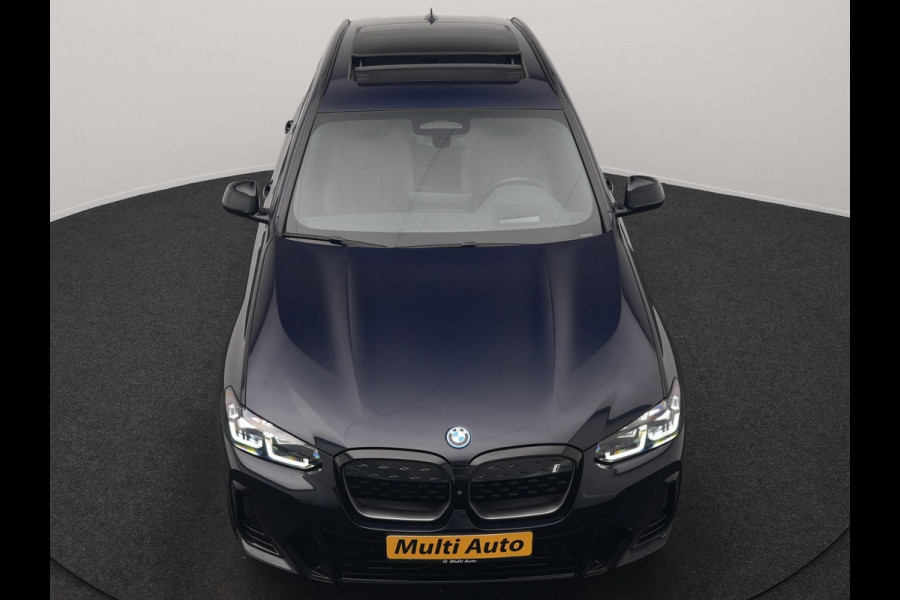 BMW iX3 M Sport 80 kWh 286pk Dealer O.H. | Trekhaak Af Fabriek | Panodak | Head Up | 360 Camera | Harman / Kardon | Lederen Sportstoelen Memory & Verwarmd | Keyless | Blis | Sfeerverlichting | 20"L.M | Adaptive LED |