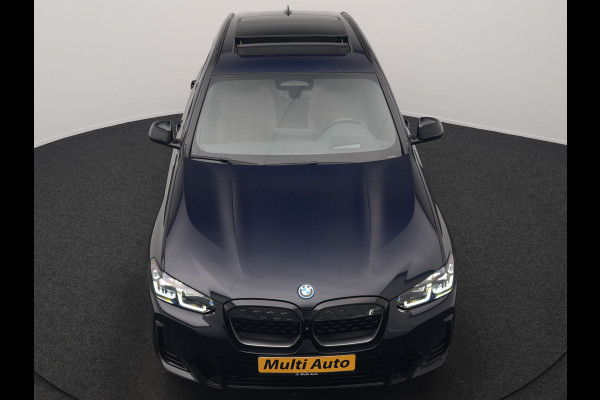 BMW iX3 M Sport 80 kWh 286pk Dealer O.H. | Trekhaak Af Fabriek | Panodak | Head Up | 360 Camera | Harman / Kardon | Lederen Sportstoelen Memory & Verwarmd | Keyless | Blis | Sfeerverlichting | 20"L.M | Adaptive LED |