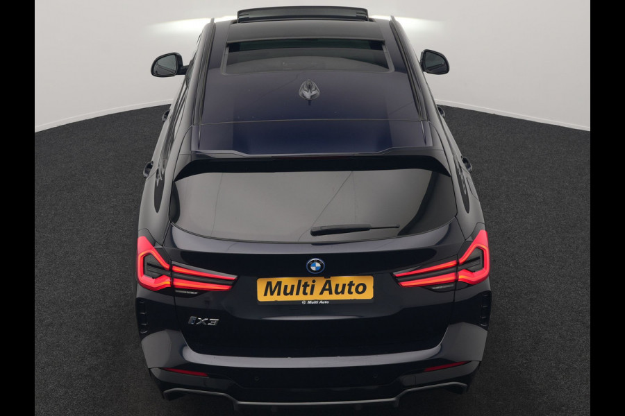 BMW iX3 M Sport 80 kWh 286pk Dealer O.H. | Trekhaak Af Fabriek | Panodak | Head Up | 360 Camera | Harman / Kardon | Lederen Sportstoelen Memory & Verwarmd | Keyless | Blis | Sfeerverlichting | 20"L.M | Adaptive LED |