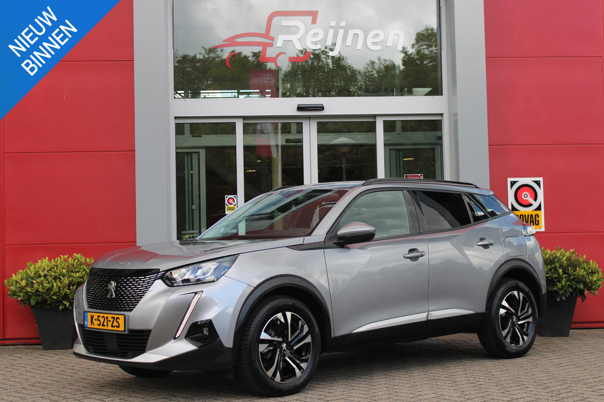 Peugeot 2008 1.2 100PK ALLURE PACK | AFNEEMBARE TREKHAAK | ACHTERUITRIJ CAMERA | NAVIGATIE | APPLE CARPLAY/ANDROID AUTO | CRUISE CONTROL | DAB+ RADIO | CLIMATE CONTROL | KEYLESS START | GETINTE RUITEN | ALL SEASON BANDEN |