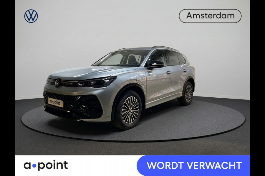 Volkswagen Tiguan 1.5 eHybrid R-Line Edition 204 pk Automaat (DSG) | Verlengde garantie | Navigatie | Trekhaak (wegklapbaar) | Parkeersensoren (Park assist) | Rondomzicht camera | Black Style pakket | R-Line |
