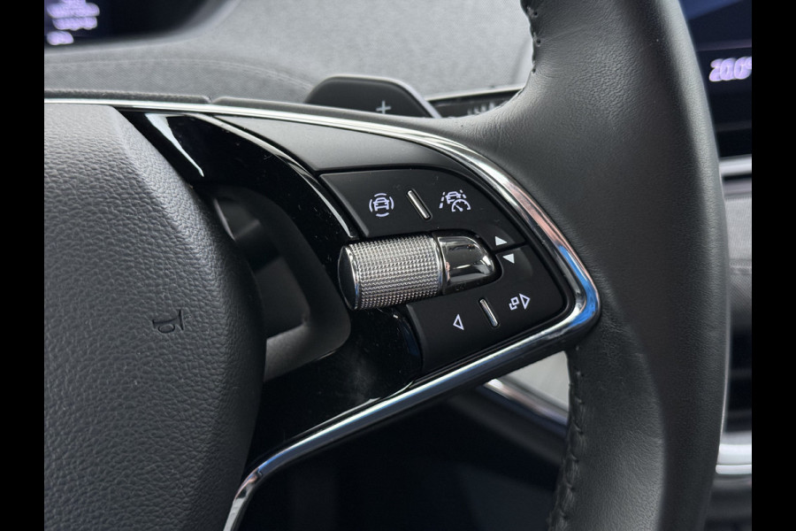 Škoda ENYAQ iV 80 Trekhaak SOH 95% Warmtepomp Adap.Cruise 3-Zone Ecc 360°Camera Stuur+Stoelverwarming Navi Ecc Pdc Draadloze telefoonlader Keyless Privacy Glas Lmv Led Apple Carplay Android Auto DAB P-Assist Dodehoek detectie File Asist 1.000KG Trekgewicht Origineel Nederlandse Auto