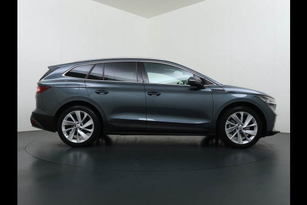 Škoda ENYAQ iV 80 Trekhaak SOH 95% Warmtepomp Adap.Cruise 3-Zone Ecc 360°Camera Stuur+Stoelverwarming Navi Ecc Pdc Draadloze telefoonlader Keyless Privacy Glas Lmv Led Apple Carplay Android Auto DAB P-Assist Dodehoek detectie File Asist 1.000KG Trekgewicht Origineel Nederlandse Auto