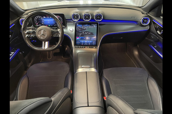 Mercedes-Benz C-Klasse Estate 300 e AMG Line C63 Diffuser/18"/Panoramadak/Laser LED/Trekhaak/Stoelverwarming + memory l + r/Adaptieve cruise/Sfeerverlichting premium/Elektrische klep/Apple Carplay & Android Auto