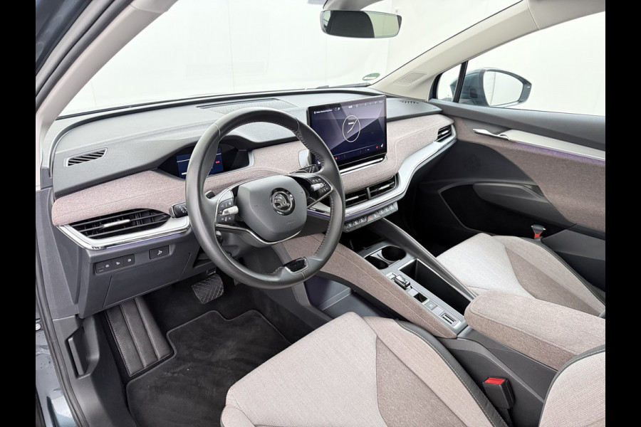 Škoda ENYAQ iV 60 First Edition Adap.Cruise Stuur+Stoelverwarming Camera 3-Zone Ecc Elek.Stoel+Memory Apple Carplay Android Auto Navi Pdc SOH 90% Keyless Advanced Matrix-Led Privacy Glas Lmv 20" DAB P-Assist Dodehoek detector Rijstrooksensor Origineel Nederlandse Auto