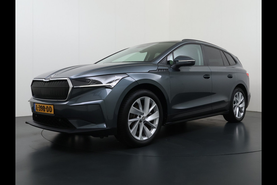 Škoda ENYAQ iV 60 First Edition Adap.Cruise Stuur+Stoelverwarming Camera 3-Zone Ecc Elek.Stoel+Memory Apple Carplay Android Auto Navi Pdc SOH 90% Keyless Advanced Matrix-Led Privacy Glas Lmv 20" DAB P-Assist Dodehoek detector Rijstrooksensor Origineel Nederlandse Auto