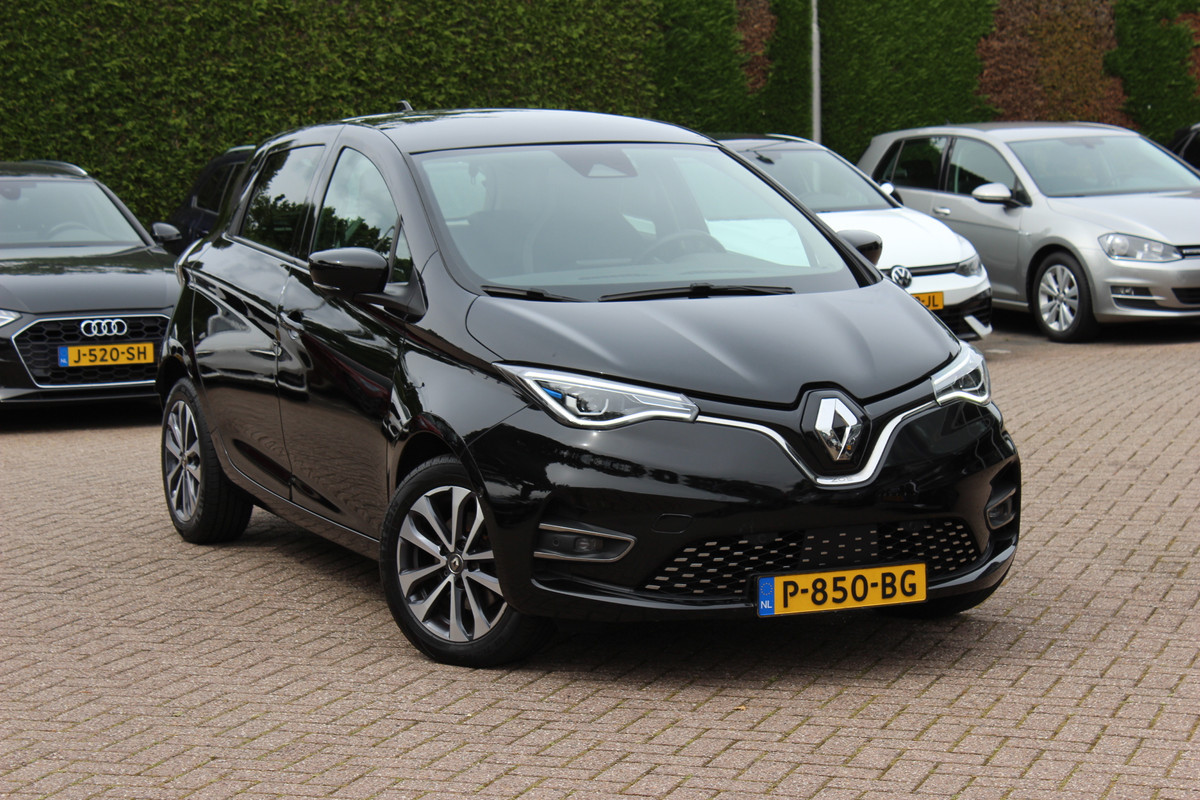 Renault ZOE R135 Intens 52 kWh / SoH 89,5% / Camera / CarPlay / Warmtepomp / Keyless / 16'' / Half leder / Dodehoek / Stuur+Stoelverwarming / DAB / Cruise Control