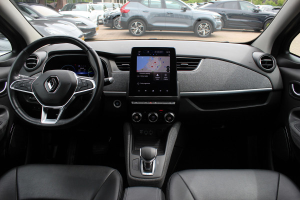 Renault ZOE R135 Intens 52 kWh / SoH 89,5% / Snelladen / Camera / CarPlay / Warmtepomp / Keyless / 16'' / Half leder / Dodehoek / Stuur+Stoelverwarming / DAB / Cruise Control