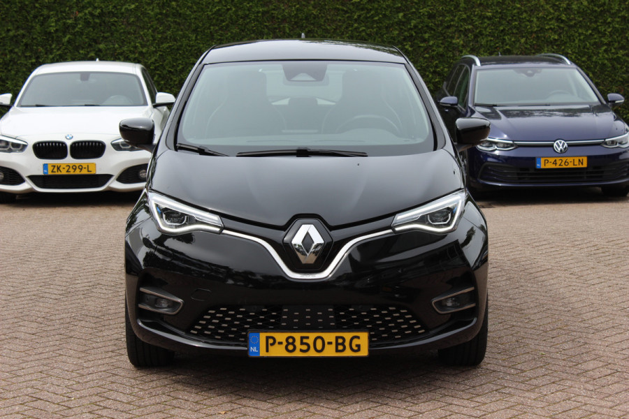Renault ZOE R135 Intens 52 kWh / SoH 89,5% / Snelladen / Camera / CarPlay / Warmtepomp / Keyless / 16'' / Half leder / Dodehoek / Stuur+Stoelverwarming / DAB / Cruise Control