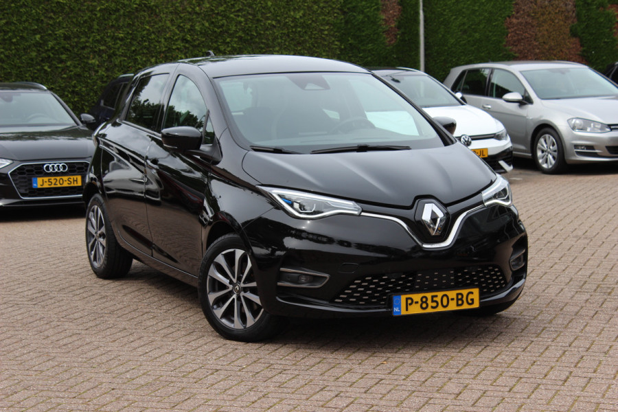 Renault ZOE R135 Intens 52 kWh / SoH 89,5% / Snelladen / Camera / CarPlay / Warmtepomp / Keyless / 16'' / Half leder / Dodehoek / Stuur+Stoelverwarming / DAB / Cruise Control