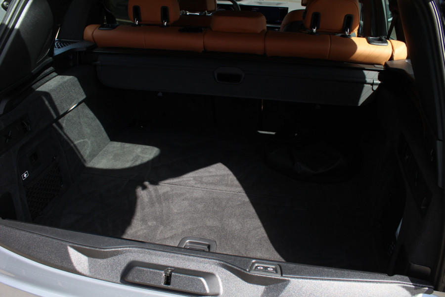 BMW X5 xDrive50e M-Sport Pro | Vierwielbesturing | Trekhaak | Spoilerpakket | H&K | Panoramadak | Luchtvering
