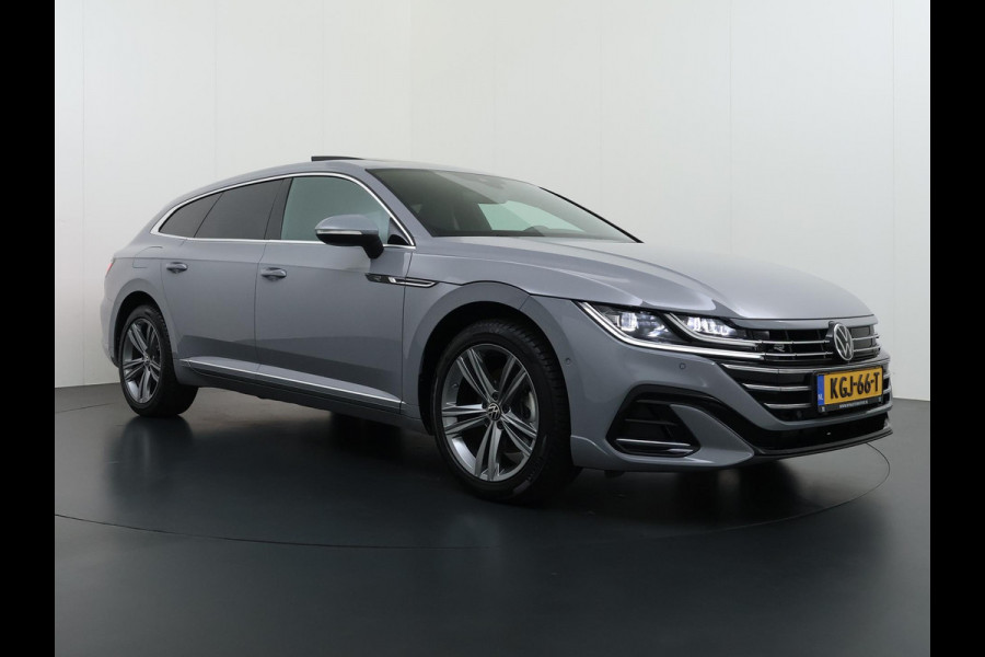 Volkswagen Arteon Shooting Brake 1.4 TSI eHybrid R-Line BINNEN + BUITEN VAN: 37.900,- VOOR: 34.877,- UW WKVOORDEEL: 3.023,- | PANO| NAPPALEDER SPORTSTOELEN| ELEK. STOEL MET MEMORY| ELEK. ACHTERKLEP| ACHTERBANK VERWARMD| CAMERA| STOELVERWARMING| CARPLAY| DODE HOEK SENSOR