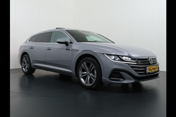 Volkswagen Arteon Shooting Brake 1.4 TSI eHybrid R-Line BINNEN + BUITEN VAN: 37.900,- VOOR: 34.877,- UW WKVOORDEEL: 3.023,- | PANO| NAPPALEDER SPORTSTOELEN| ELEK. STOEL MET MEMORY| ELEK. ACHTERKLEP| ACHTERBANK VERWARMD| CAMERA| STOELVERWARMING| CARPLAY| DODE HOEK SENSOR
