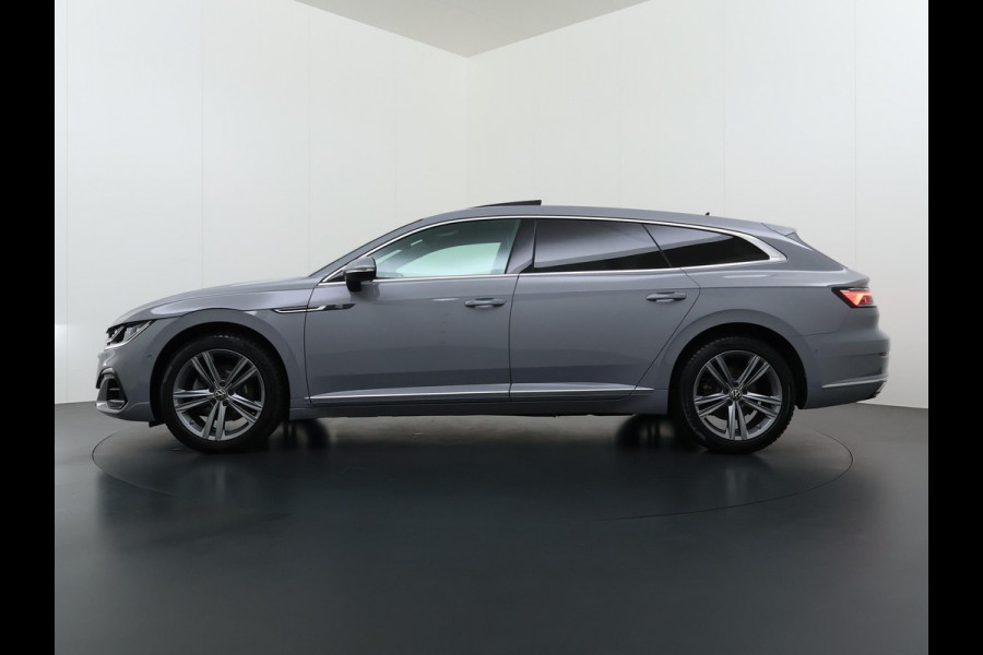 Volkswagen Arteon Shooting Brake 1.4 TSI eHybrid R-Line BINNEN + BUITEN VAN: 37.900,- VOOR: 34.877,- UW WKVOORDEEL: 3.023,- | PANO| NAPPALEDER SPORTSTOELEN| ELEK. STOEL MET MEMORY| ELEK. ACHTERKLEP| ACHTERBANK VERWARMD| CAMERA| STOELVERWARMING| CARPLAY| DODE HOEK SENSOR