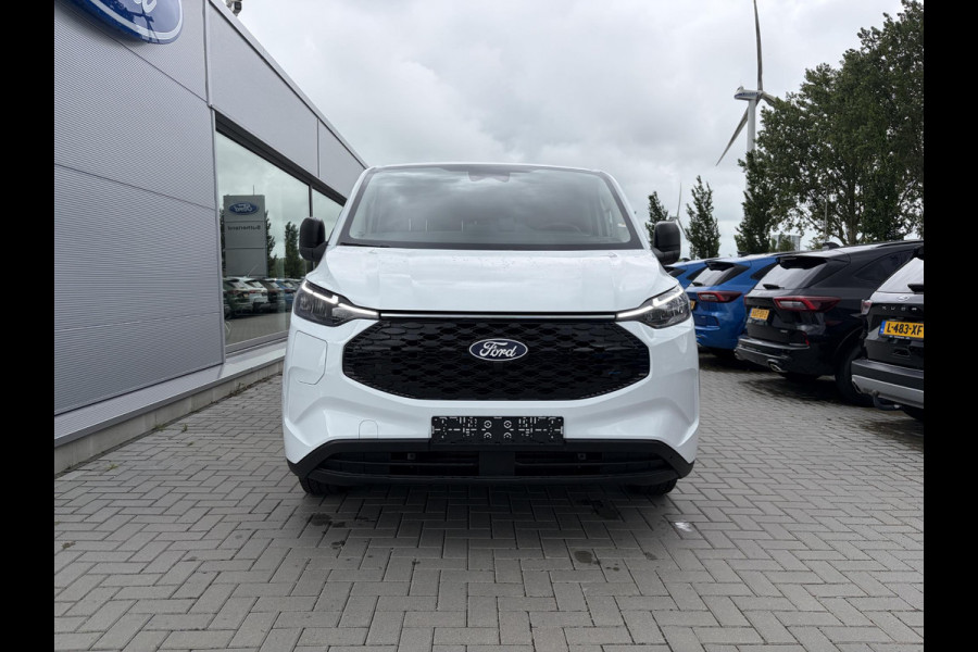 Ford E-Transit Cust. 340 L2H1 Trend 71 kWh ZUID 136pk | Bekleding zijwand en achterdeuren (volledig) | Laadvloer bescherming | 8-weg verstelbare en verwarmbare bestuurdersstoel met armsteun (i.c.m. bijrijdersbank) | Trekhaakvoorbereiding | Allweather banden | AGM accu | Laadkabel 10 | LED laadruimteverlichting (5 spots) | Vehicle Integration System