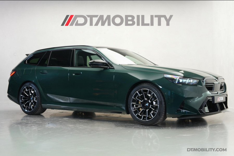 BMW 5 Serie Touring M5 | M-Drivers Pack | Keramisch | Akrapovič | Goodwood Grün Sonderlackierung