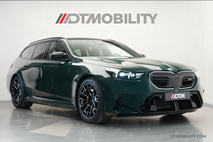 BMW 5 Serie Touring M5 | M-Drivers Pack | Keramisch | Akrapovič | Goodwood Grün Sonderlackierung