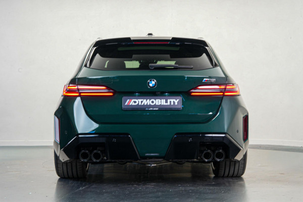 BMW 5 Serie Touring M5 | M-Drivers Pack | Keramisch | Akrapovič | Goodwood Grün Sonderlackierung